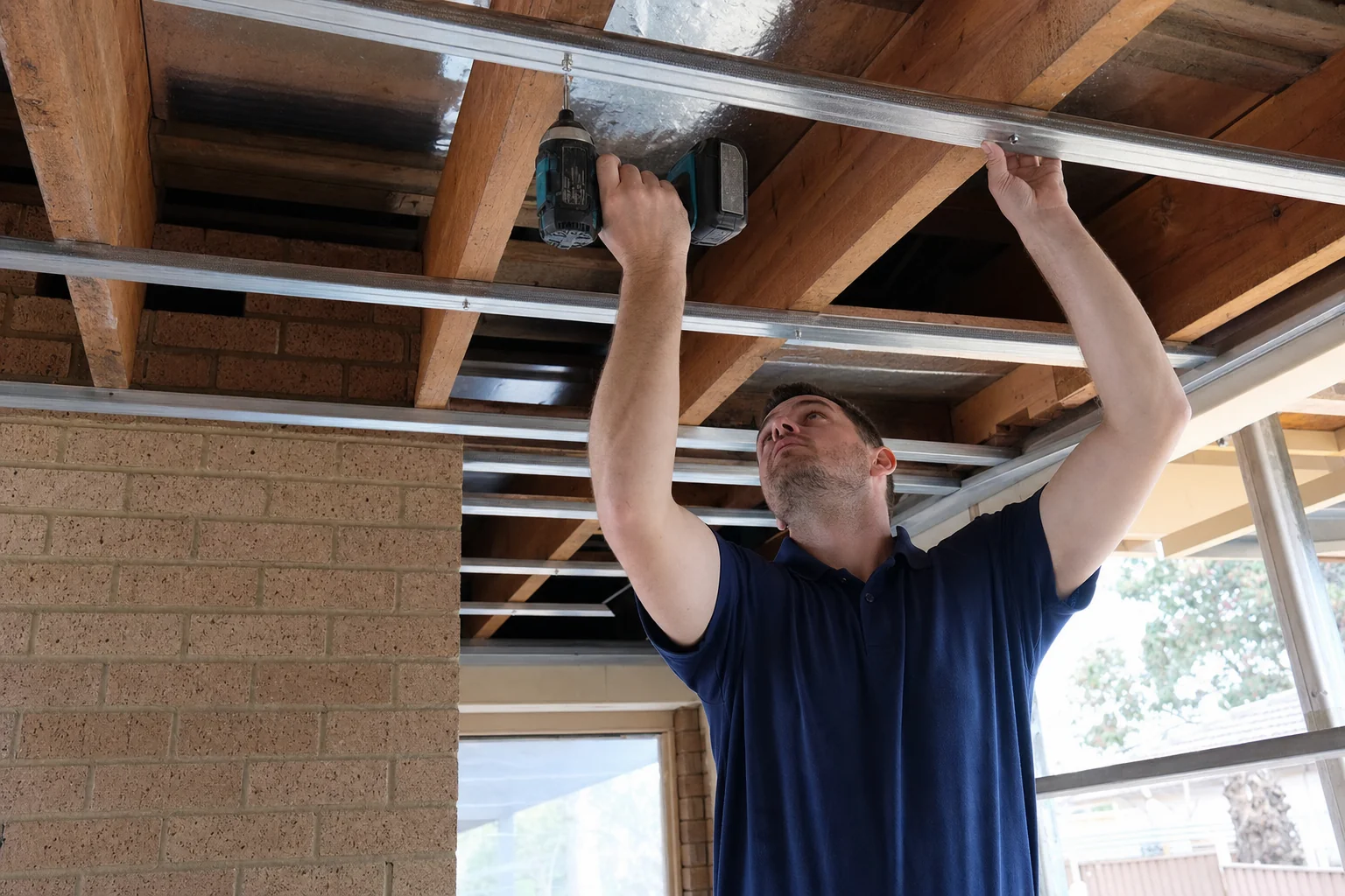 Metal furring channel restrapping fixed to ceiling joists in Perth