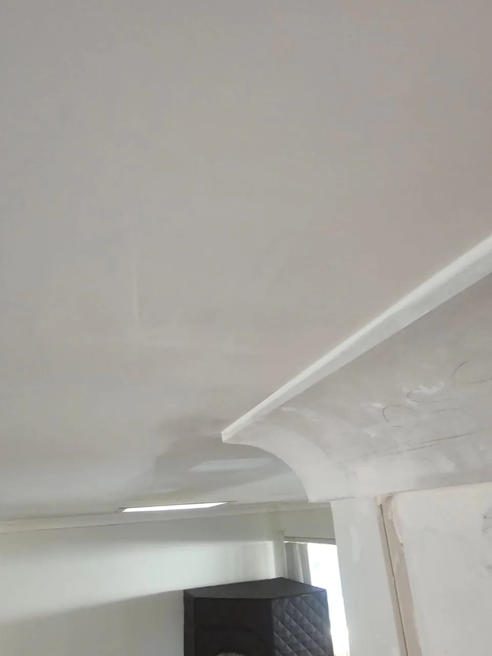 Close view of a plaster cornice and ceiling junction in a Bassendean home, the line clean and the surface smooth