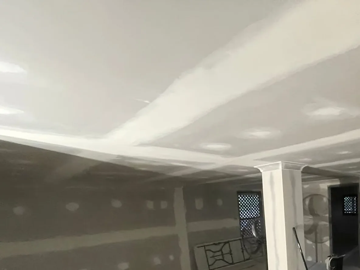 New plasterboard ceiling sheeted and set through an open plan living area